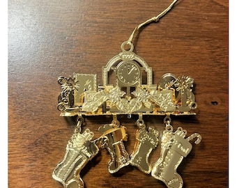 Reloj colgante 3D con forma de calcetín navideño de Danbury Mint Holiday