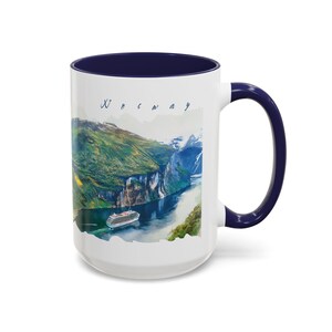 May include: A set of three ceramic mugs with a speckled, matte finish. The mugs are in shades of cream, light gray, and dark gray. Each mug has a simple, minimalist design, perfect for coffee or tea.