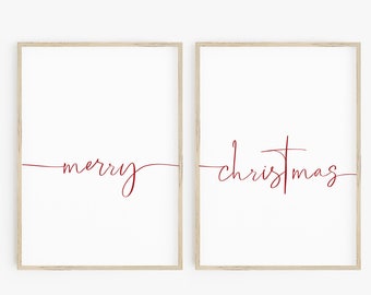 May include: Two framed prints with the words "merry" and "christmas" in red cursive script on a white background.