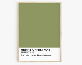May include: A framed print with a green background and the text "Merry Christmas" in black. Below the text is the color code "C46 M28 Y72 K5" and the phrase "Find Me Under The Mistletoe" in black.