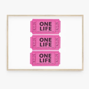 May include: Three pink ticket stubs with the text "ONE LIFE" printed on them. Each ticket has the number "742126" printed on the sides. The text "Limit one (1) per person. Make it count." is printed on each ticket.