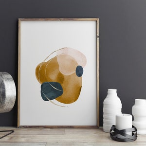 May include: A framed abstract print with a watercolour design featuring overlapping shapes in shades of mustard yellow, peach, and teal.