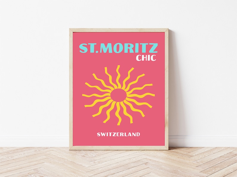 May include: A pink and blue poster with the text "ST. MORITZ CHIC SWITZERLAND". A yellow sun with wavy rays is in the center of the poster.