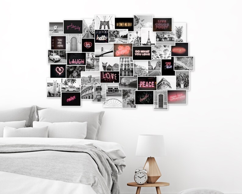 May include: A black and white photo collage featuring various images and text, including "laugh", "love", "peace", and "do what you love". The collage is displayed on a white wall above a gray bed with white bedding.