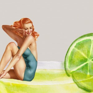 May include: A woman in a blue swimsuit sits on a yellow and green surface with a lime wedge to the right.