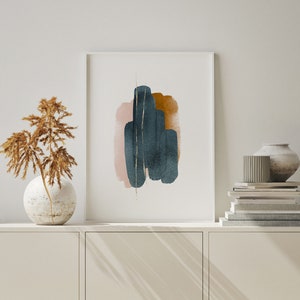 May include: Abstract art print with a white background and a design of overlapping shapes in shades of pink, brown, and blue. The shapes are painted in a watercolor style and have a textured look.