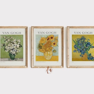 May include: Three framed prints of famous Van Gogh paintings. The first print features a vase of white flowers on a green background. The second print features a vase of sunflowers on a yellow background. The third print features a vase of blue irises on a yellow background.