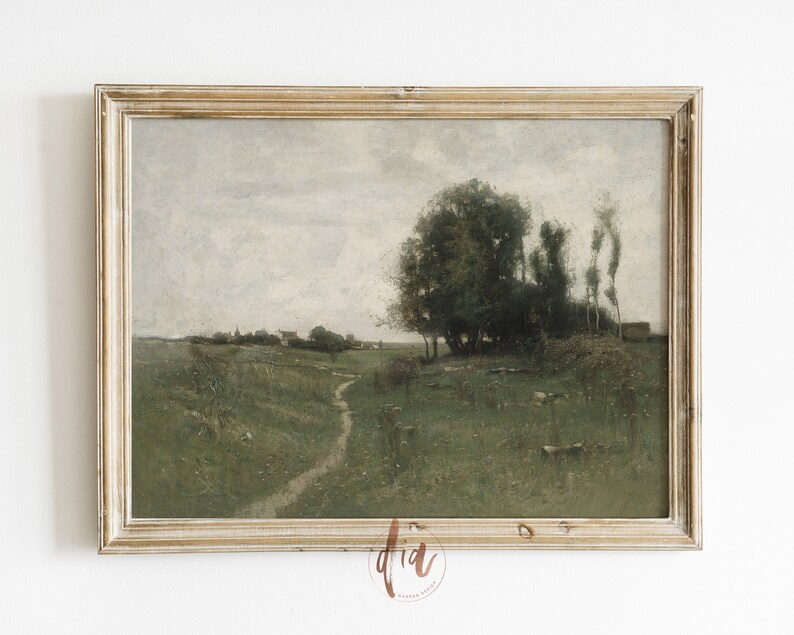 May include: A framed painting depicting a rural landscape with a winding path leading to a small village in the distance. The painting features a cloudy sky, green fields, and a cluster of trees in the foreground.
