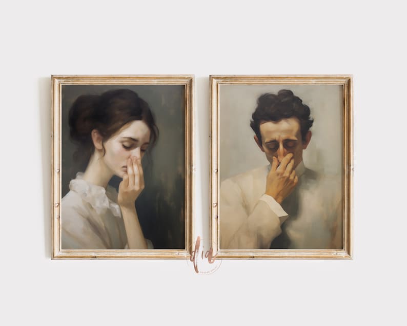 May include: Two framed paintings of people with their heads bowed down. The painting on the left is of a woman with dark hair and a white dress. The painting on the right is of a man with dark hair and a white shirt.
