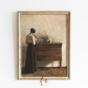 May include: A vintage painting of a woman in a white blouse and dark skirt standing in front of a wooden dresser with a vase of flowers and candles on top.
