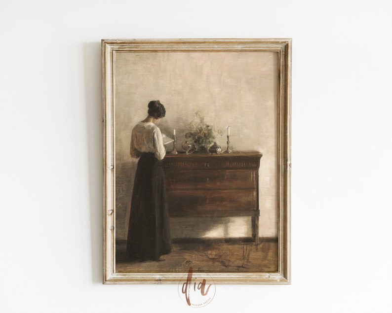 May include: A vintage painting of a woman in a white blouse and dark skirt standing in front of a wooden dresser with a vase of flowers and candles on top.