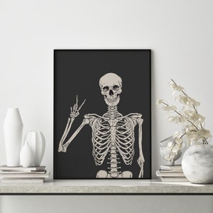 May include: A black and white illustration of a skeleton making a peace sign against a black background.