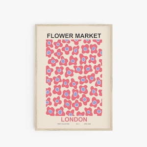 May include: A printable poster with a floral design. The poster features a cream background with pink and blue flowers. The text "FLOWER MARKET LONDON" is printed at the top and bottom of the poster.