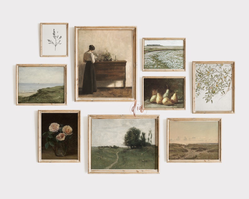 May include: A gallery wall featuring nine framed prints with various subjects, including landscapes, still life, and botanical illustrations. The prints are all in a similar style, with a light brown frame and a white mat.