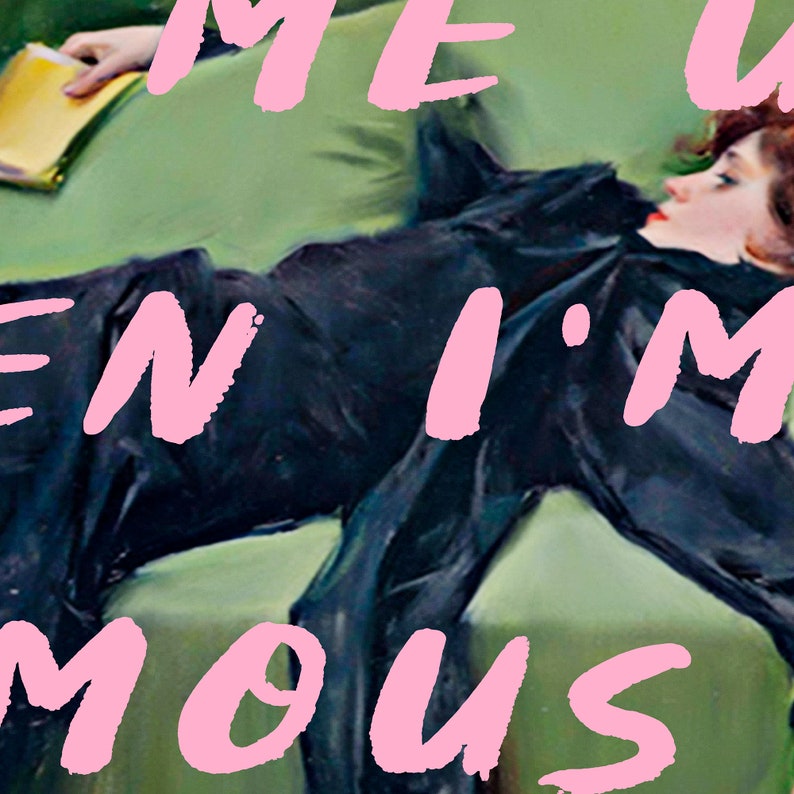 May include: A woman in a black dress lies on a green couch with a book in her hand. The text "WHEN I'M ENIMOUS" is written in pink letters across the image.