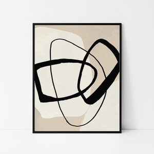 May include: Abstract art print featuring black lines and shapes on a beige background.