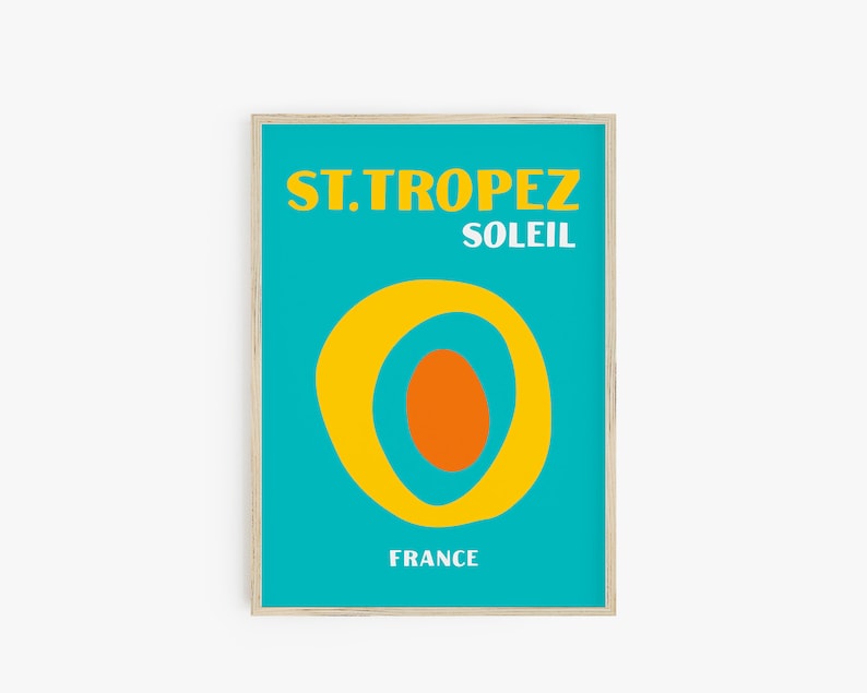 May include: A turquoise blue poster with a yellow sun graphic and the text "ST. TROPEZ SOLEIL FRANCE".