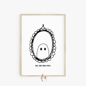 May include: Black and white illustration of a ghost in a frame with the text "You are Boo-tiful".