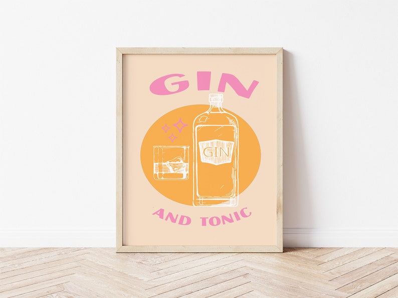 May include: A framed print with a yellow and orange background and pink text that reads "GIN AND TONIC". A white outline of a bottle of gin and a glass of gin and ice are in the center of the print.