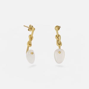 Handmade long brass 18k gold plated knot earrings with Moonstone gem. Boho-chic artisanal jewelry, perfect for elegant and natural looks.