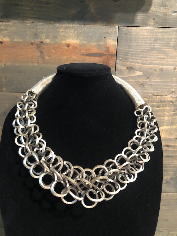 White Metal Miao Tribal Necklace on Iron Stand White Metal Miao Tribal Necklace on Iron Stand