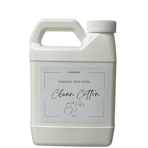 Pode incluir: Uma garrafa de plástico branca com um rótulo branco que diz "Handmade Essential Soap Store Clean Cotton 32 oz."