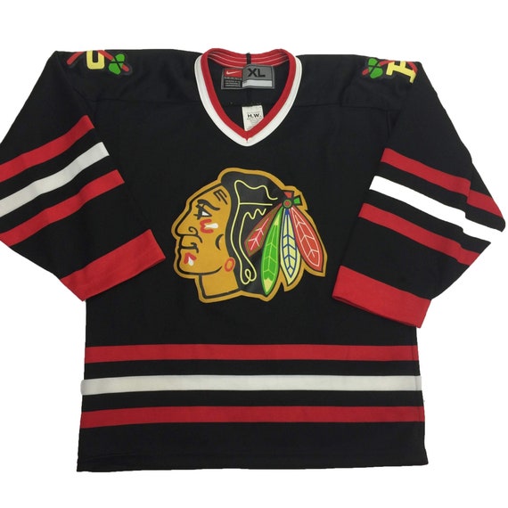 black on black blackhawks jersey