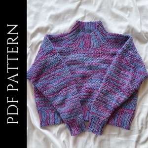 May include: A crocheted sweater with a high neck and a striped pattern in shades of purple and blue.