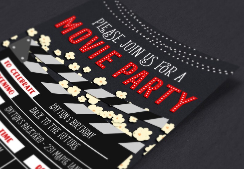 May include: Black and white movie clapperboard with red text that says "MOVIE PARTY" and "PLEASE JOIN US FOR A". The background is black with white popcorn scattered on it. The text also says "TO CELEBRATE" and "PAYTON'S BIRTHDAY".