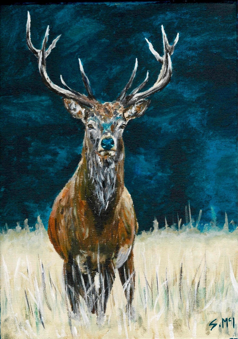 May include: An oil painting of a majestic stag with large antlers, set against a dark teal background. The stag has a brown and white coat, and is standing in a field of tall, yellow grass. The artwork is signed in the lower right corner.