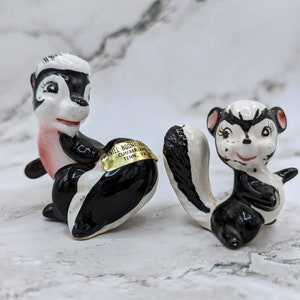 Figurine vintage di mamma e bambino Skunk Giappone