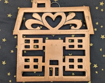 Salvamanteles con forma de casa de cobre de Pampered Chef