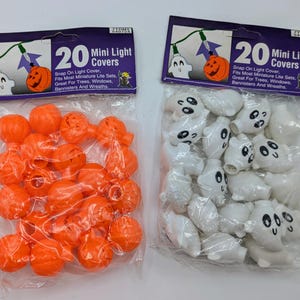 May include: Two packets of Halloween mini light covers. One contains orange pumpkin-shaped covers, the other white ghost-shaped covers. Each packet has a label that reads "20 Mini Light Covers".