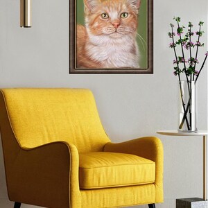 May include: A framed portrait of a ginger cat with green eyes. The cat's fur is a mix of orange and white. The painting is in a dark brown frame, set against a green background. A yellow armchair and a vase of flowers are in the foreground.