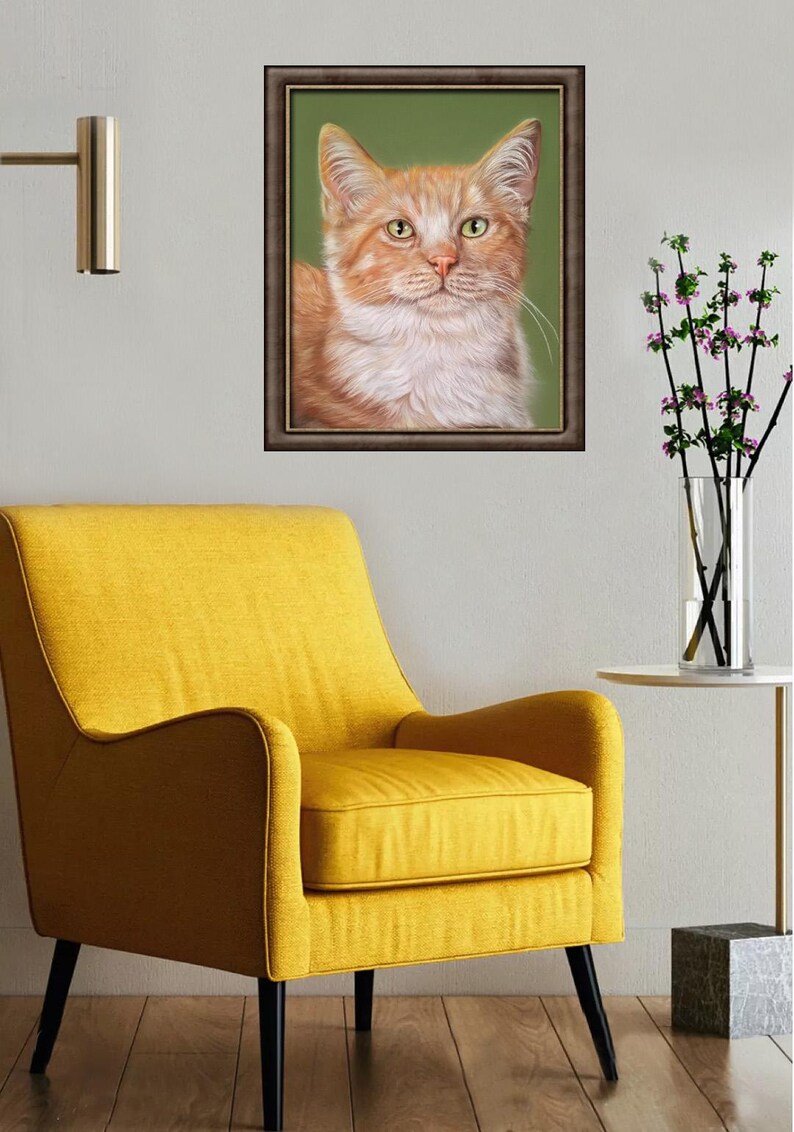 May include: A framed portrait of a ginger cat with green eyes. The cat's fur is a mix of orange and white. The painting is in a dark brown frame, set against a green background. A yellow armchair and a vase of flowers are in the foreground.