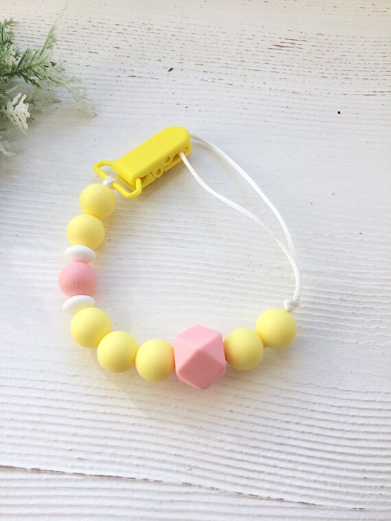 yellow pacifier