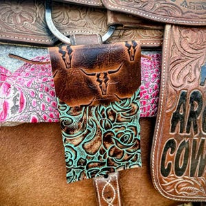 Leather back cinch phone holder for saddle saddle sack pocket