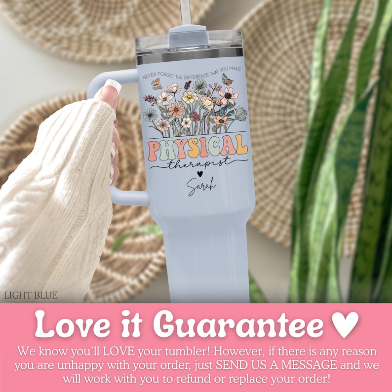 May include: Light blue tumbler with a handle, featuring the text "PHYSICAL therapist Sarah" in a retro font, with a floral and butterfly design. The top of the tumbler reads "NEVER FORGET THE DIFFERENCE THAT YOU MAKE".