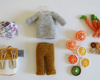 Kit for the perfect globetrotter - backpack, pants, sweater and treats