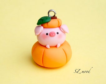 Pig on pumpkin keychain - polymer clay
