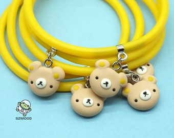 Rubber bracelet, adjustable to size, with handmade polymer clay pendant, teddy bear