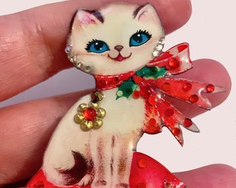 Retro festive cat on a cushion brooch