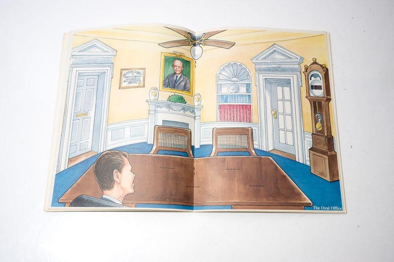 May include: Illustration of the Oval Office, featuring a large wooden desk, two chairs, and a portrait. The room has a blue carpet, yellow walls, and a grandfather clock. The text "The Oval Office" is visible.