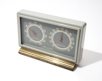 Termómetro y medidor de humedad de escritorio de mediados de siglo, Airguide, c. 1960.