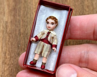 Miniature handmade “Bebe Jumeau” porcelain toy doll, 1/12 scale