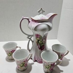 Nipping pink floral tea set