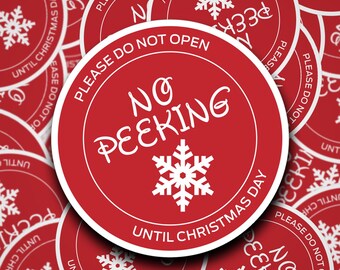 Adesivi natalizi vietati agli sbirciatori - Non aprire prima del giorno di Natale - Design adesivo rosso natalizio con divieto di sbirciare e fiocco di neve.