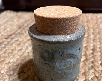 Large carved corked vessel. Blue