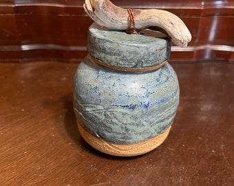 Large blue vessel with driftwood handle