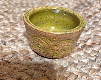 Small hand carved green open vessel